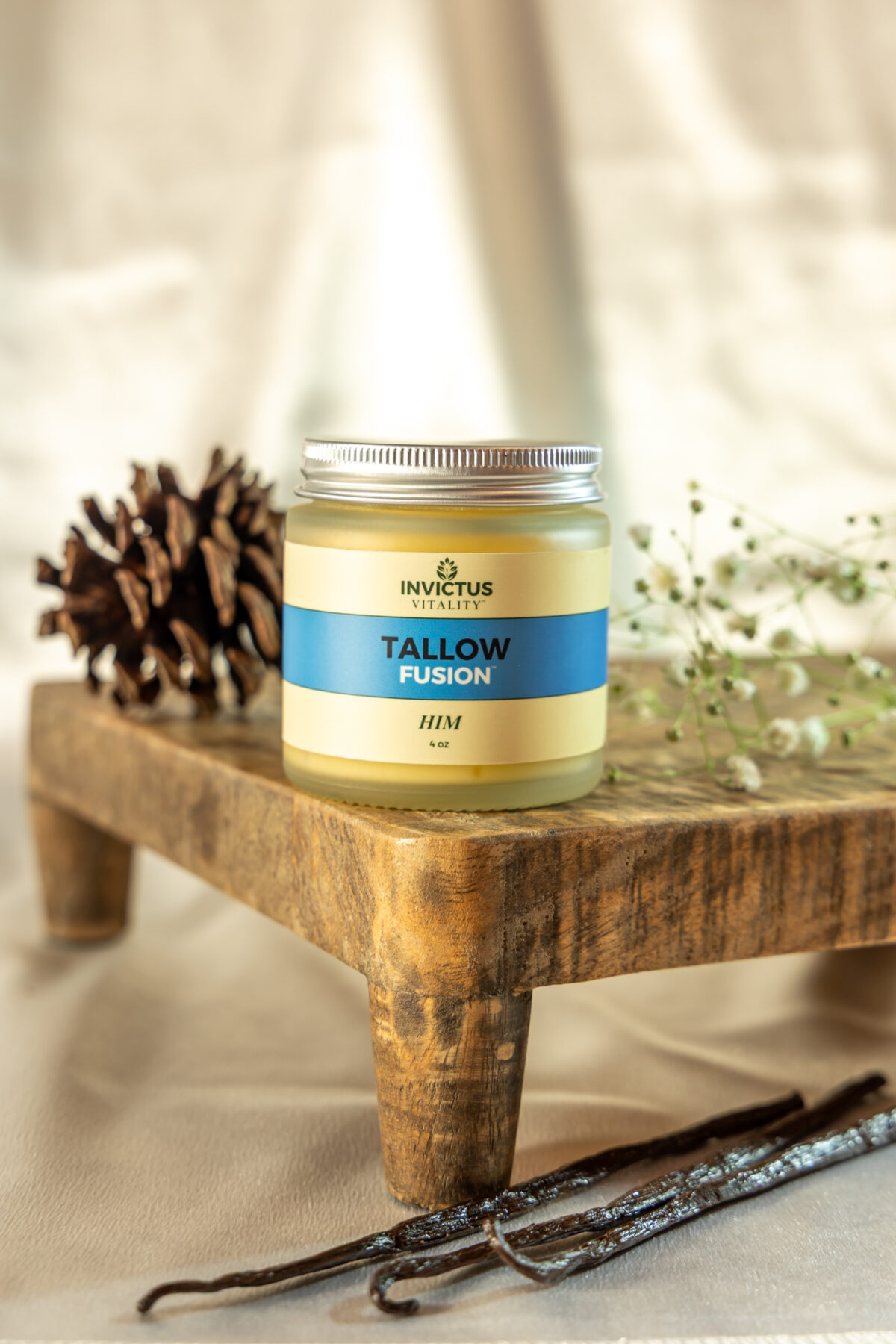 Tallow Fusion for Him 4 oz glass jar with sustainable bamboo lid by Invictus Vitality, featuring nourishing natural skincare balm for men.